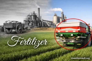 A tractor spreading fertilizer on green fields, showcasing the invention of fertilizer for soil enrichment.